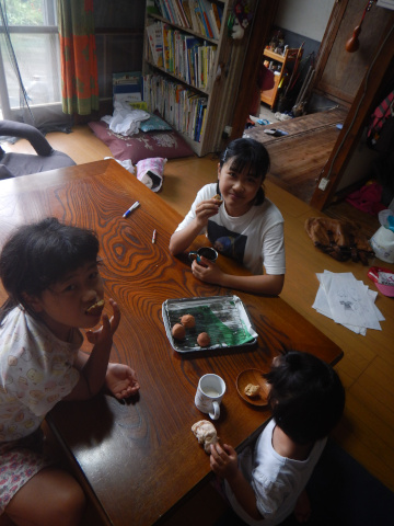 Snack time with sisters. 